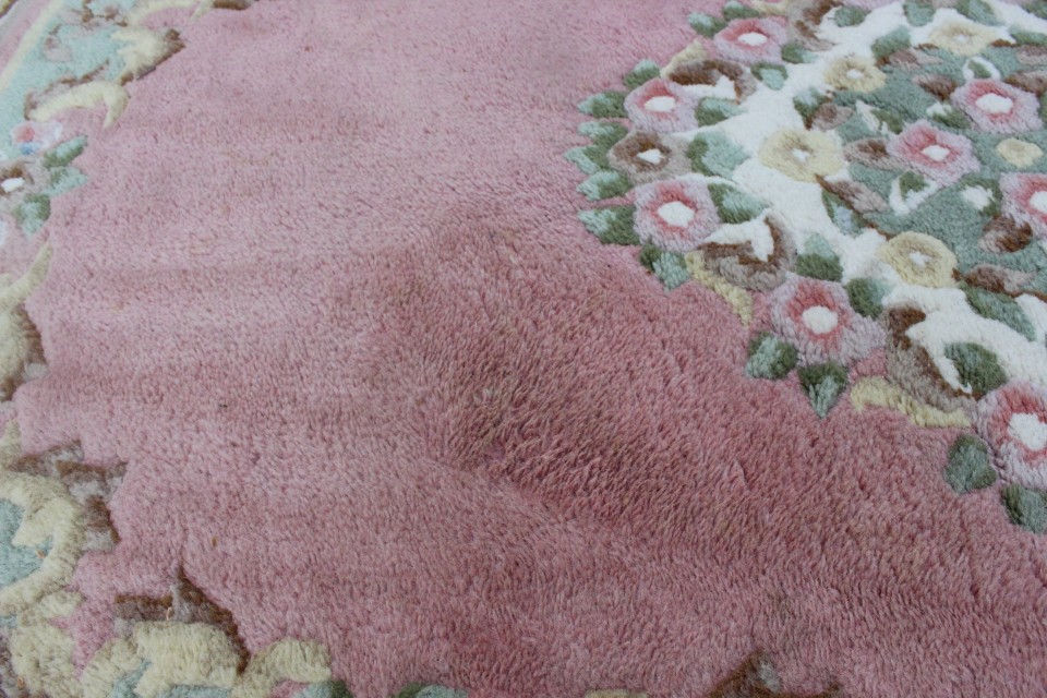 Oud Oosters roze handgeknoopt tapijt